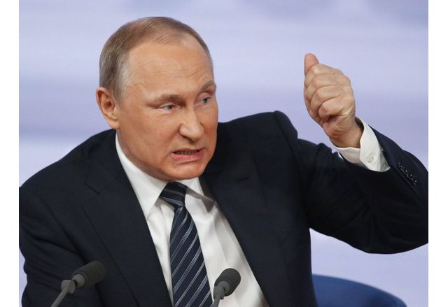 Военнопрестъпник № 1 Владимир Путин в момента произнася годишното си