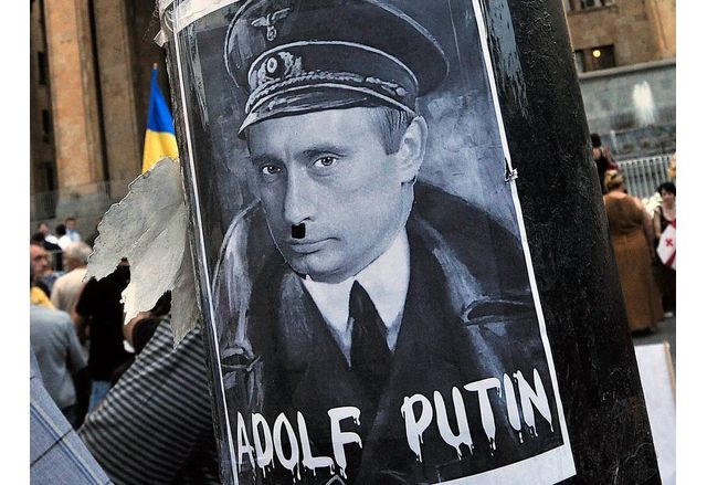 Плакат на протестиращи в Полша срещу агресията на Русия в Украйна