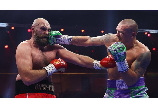 Олександър Усик 23 0 официално опази световните си титли в тежка